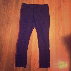 Black high waisted skinny jeans w/ distressed hem